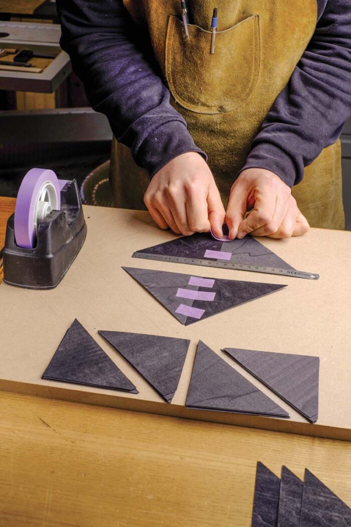 Vasko tapes together four quadrants of black veneer, orienting all the grain pointing inward.